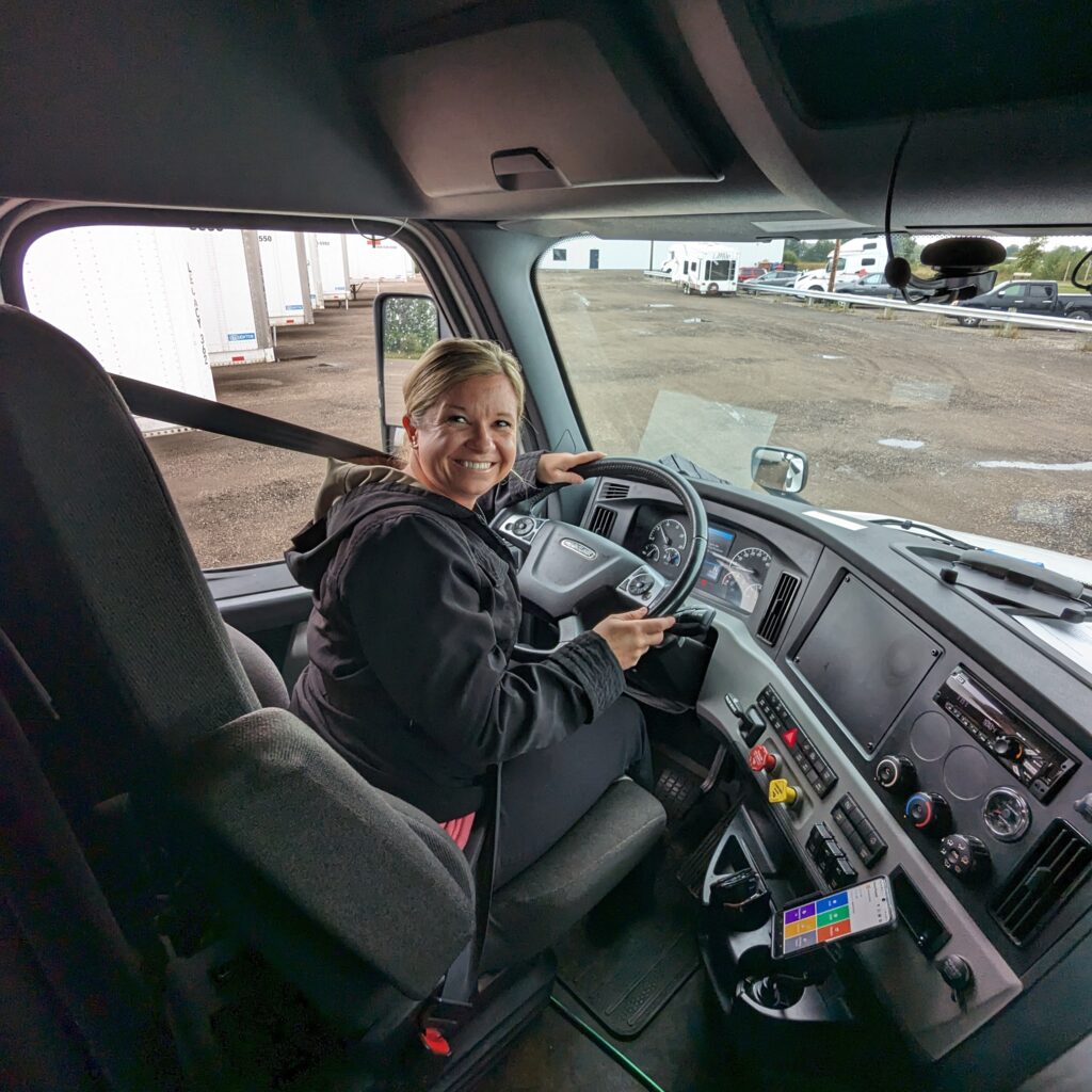 Jill driving a truck
